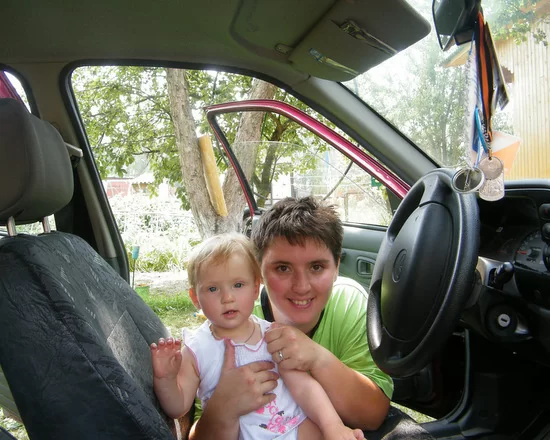 Посылаю фотогафии Евдокии с ее первого дня рождения
